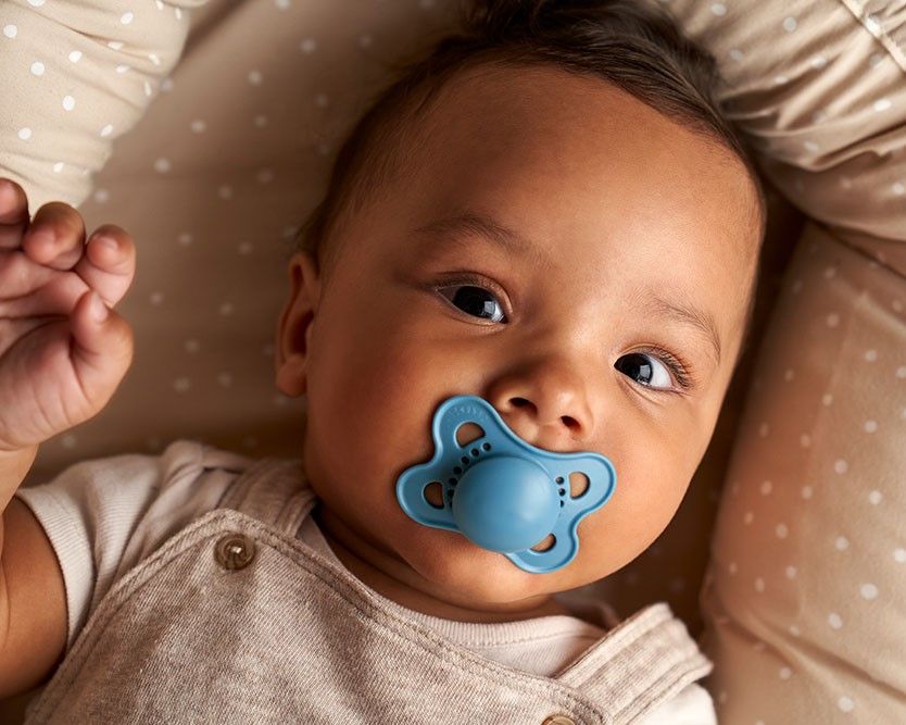 Baby spits hot sale out pacifier