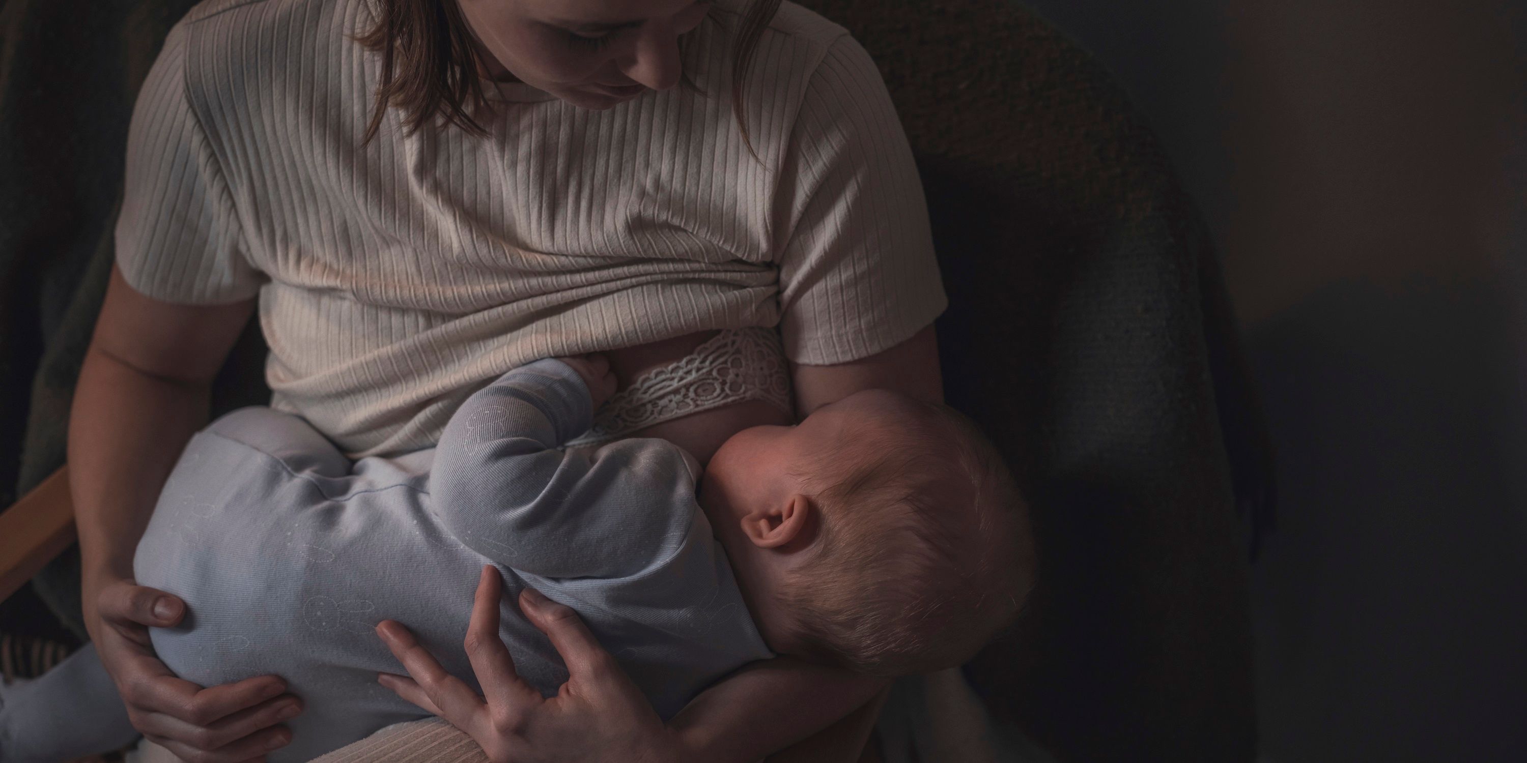 mother breastfeeding baby